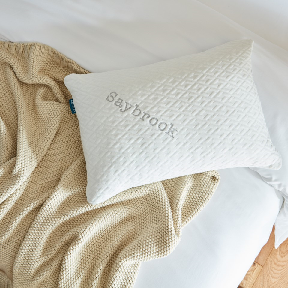 Saybrook Pillow on Bed and Throw Blanket